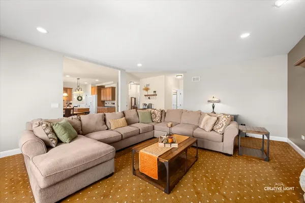 a living room with furniture and a couch