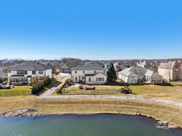 a view of a lake with a house