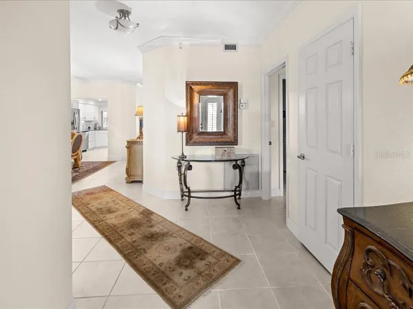 a living room with table and chair