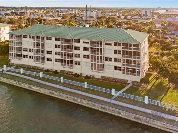 a view of a lake with building in front of it