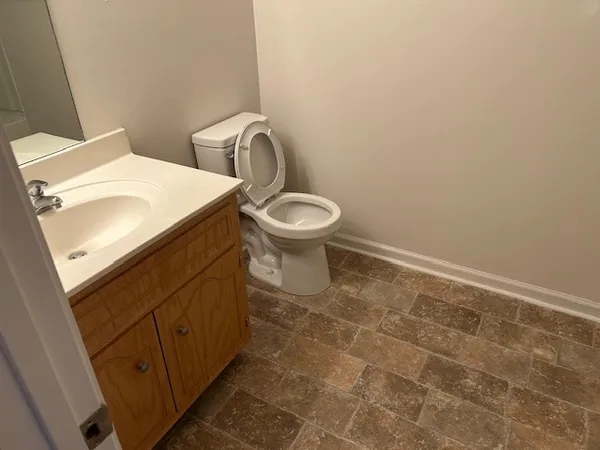 a bathroom with a sink and a toilet