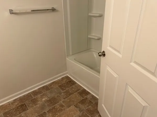 a bathroom with a bathtub