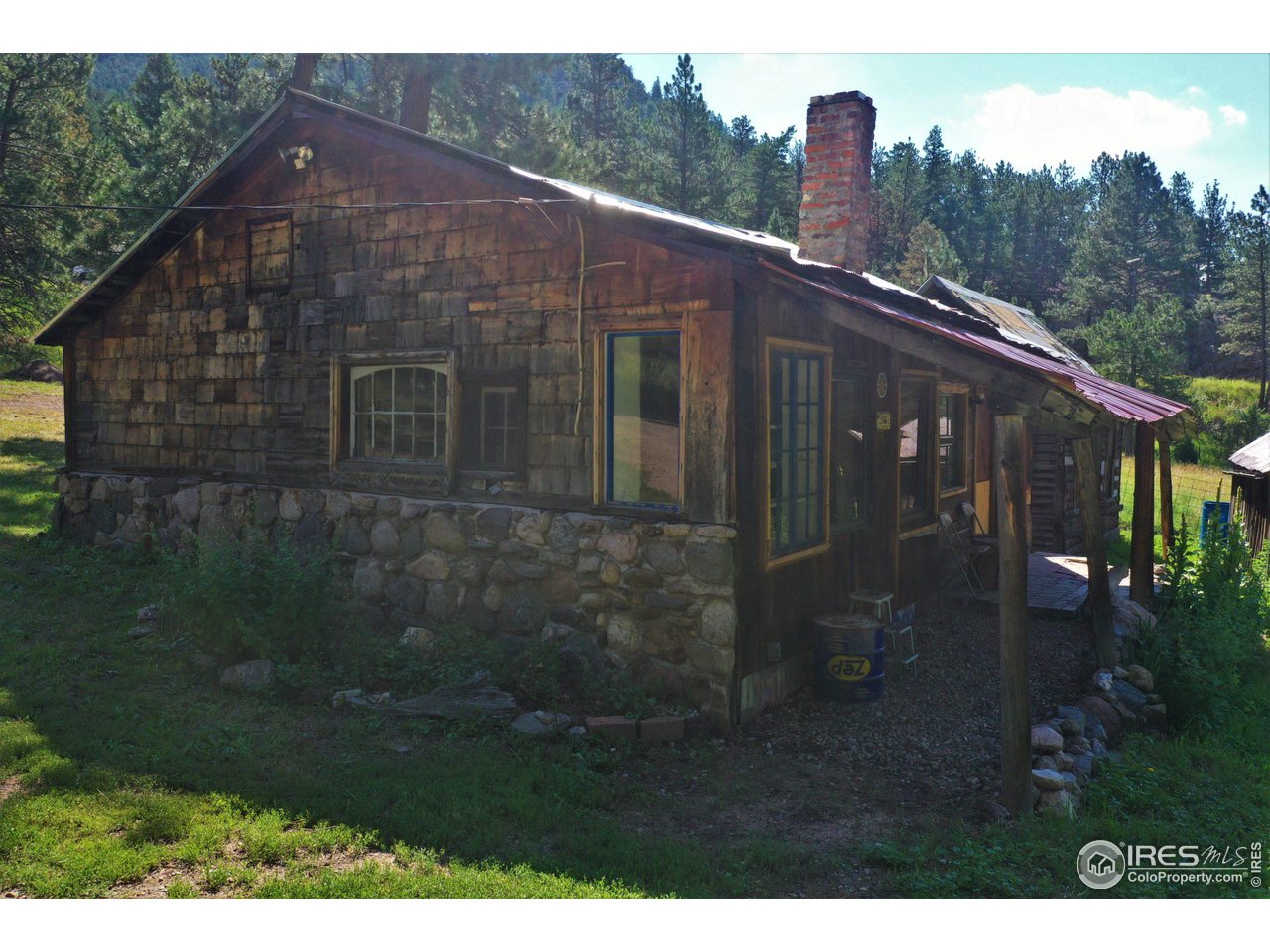 9648 Highway 36 Lyons, CO 80540 - Photo 17 of 31 a view of a small house