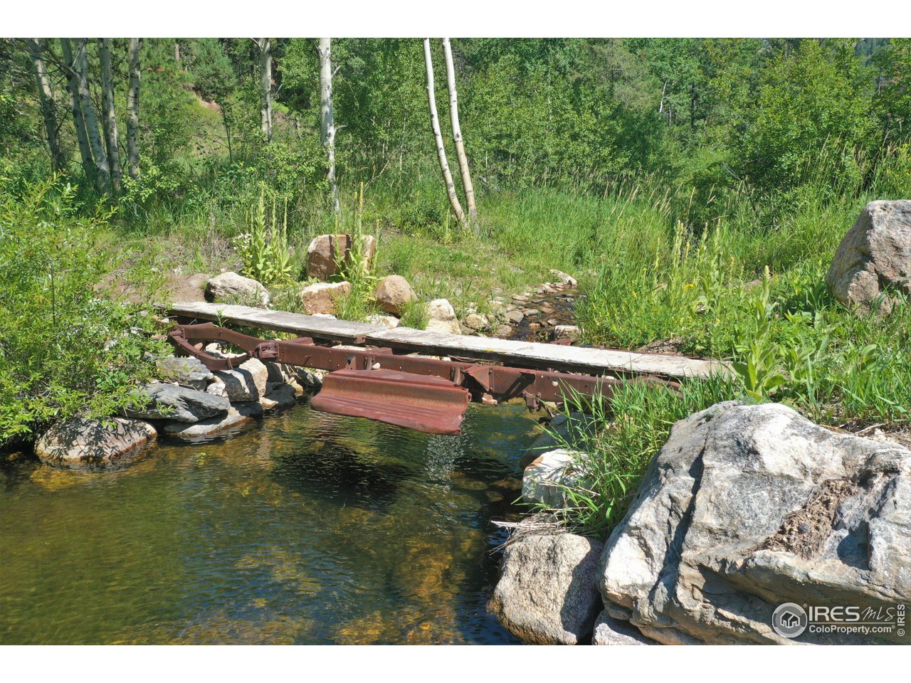 9648 Highway 36 Lyons, CO 80540 - Photo 24 of 31 a view of swimming pool from a balcony