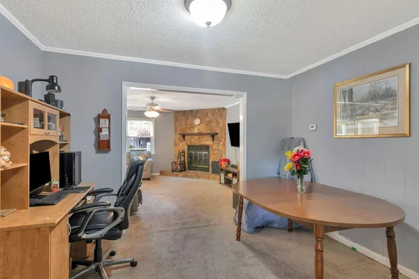 a room with furniture and gym equipment