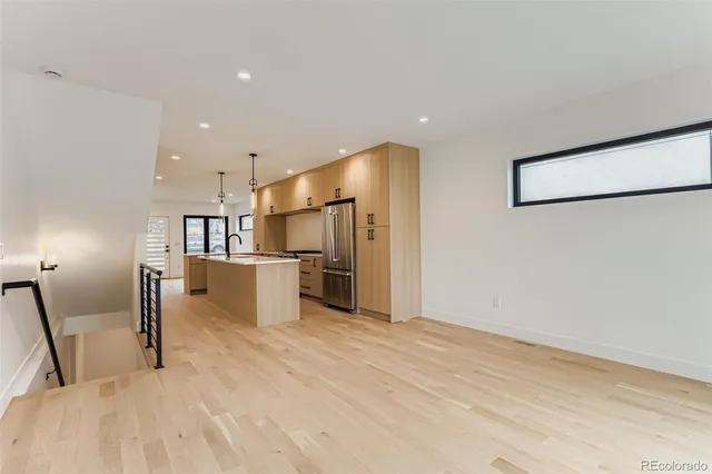 a view of a kitchen with a sink