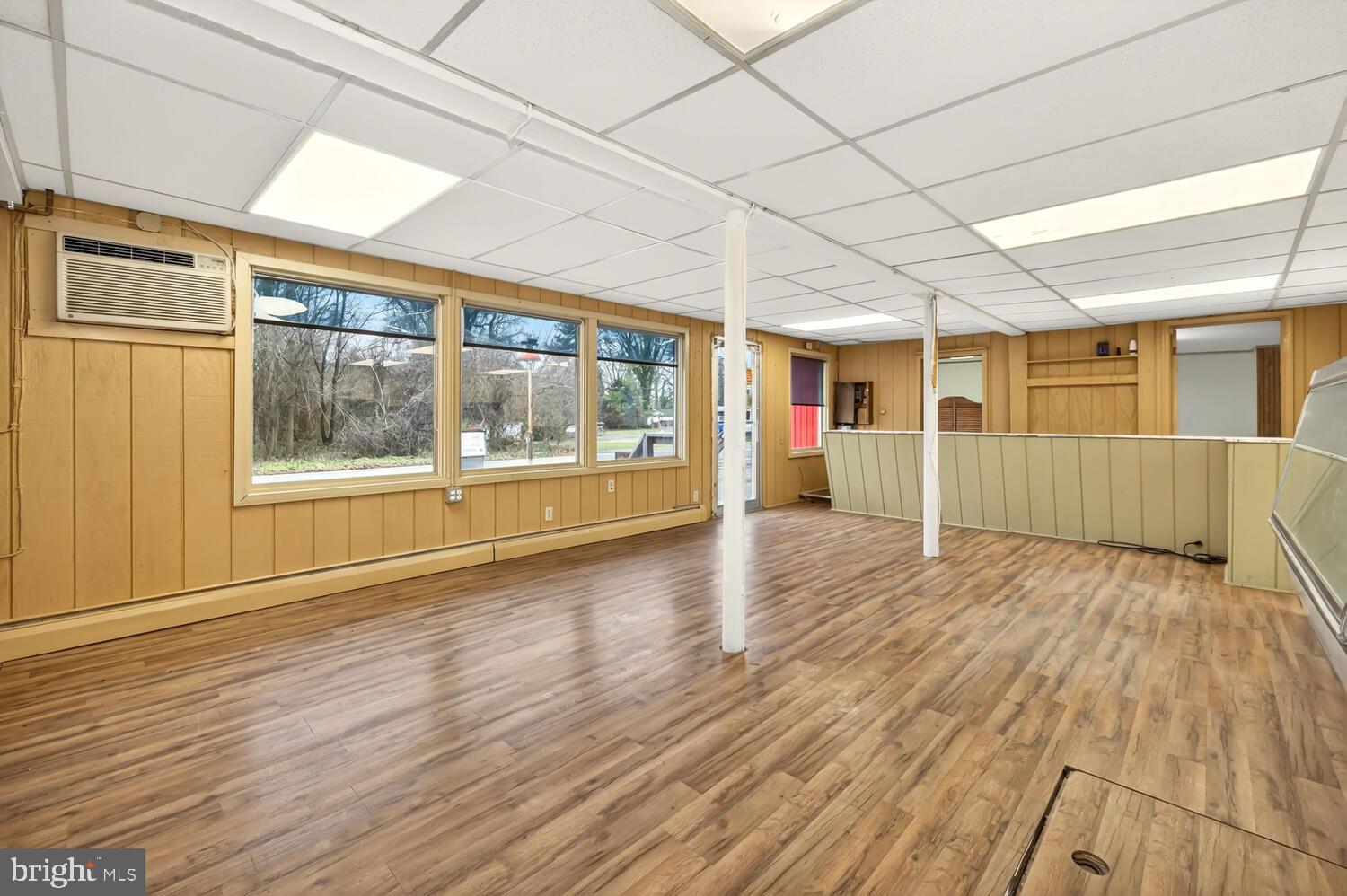 6746 Quaker Neck Road Chestertown, MD 21620 - Photo 15 of 50 Spacious, sunlit room with wooden accents.