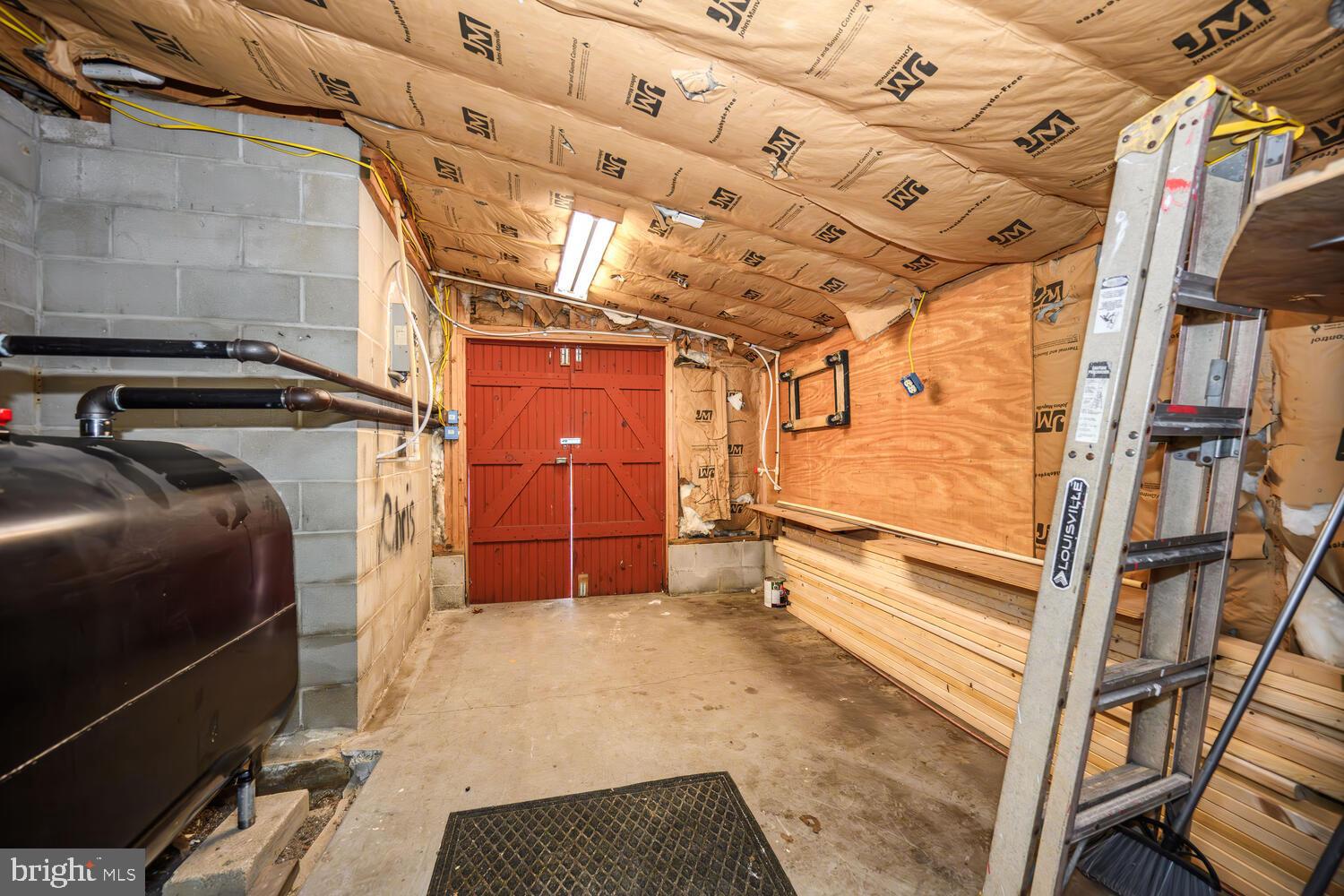 6746 Quaker Neck Road Chestertown, MD 21620 - Photo 33 of 50 Spacious garage with rustic charm.