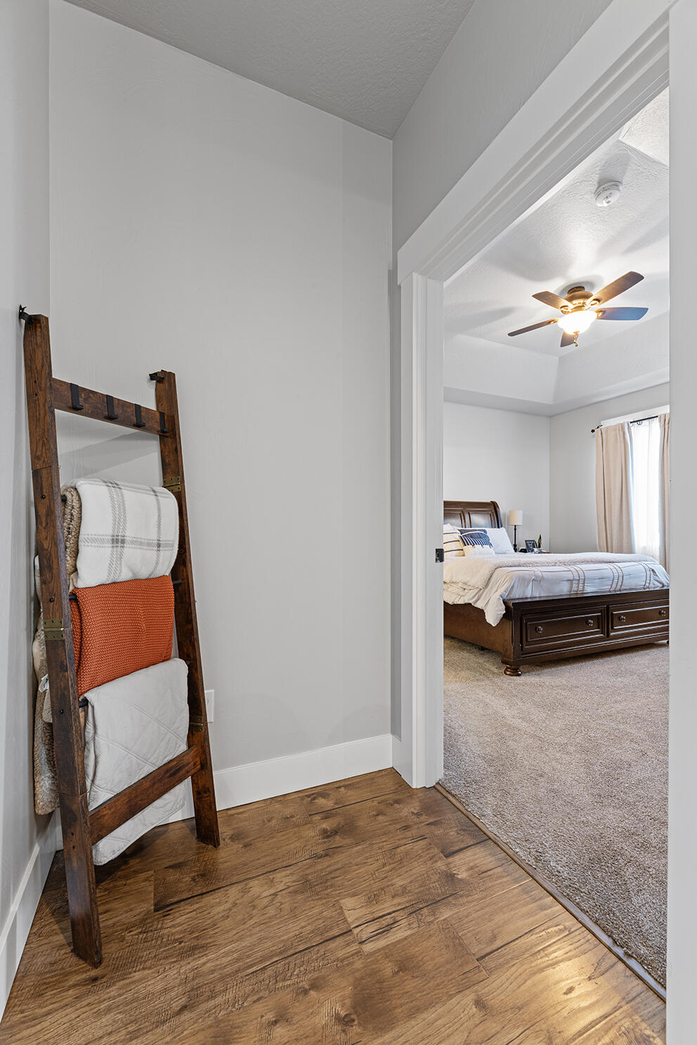 1043 Arrowhead Trail Eagle Point, OR 97524 - Photo 14 of 29 a bedroom with furniture and wooden floor