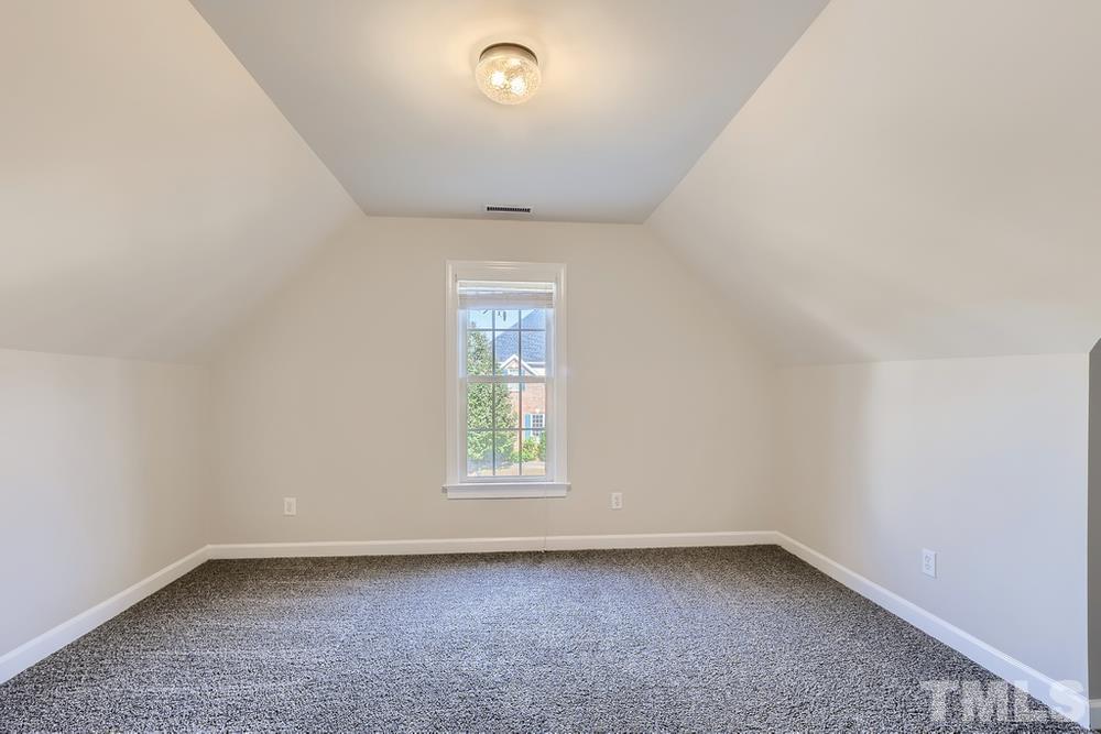 6040 Big Sandy Drive Raleigh, NC 27616 - Photo 21 of 28 an empty room with a window