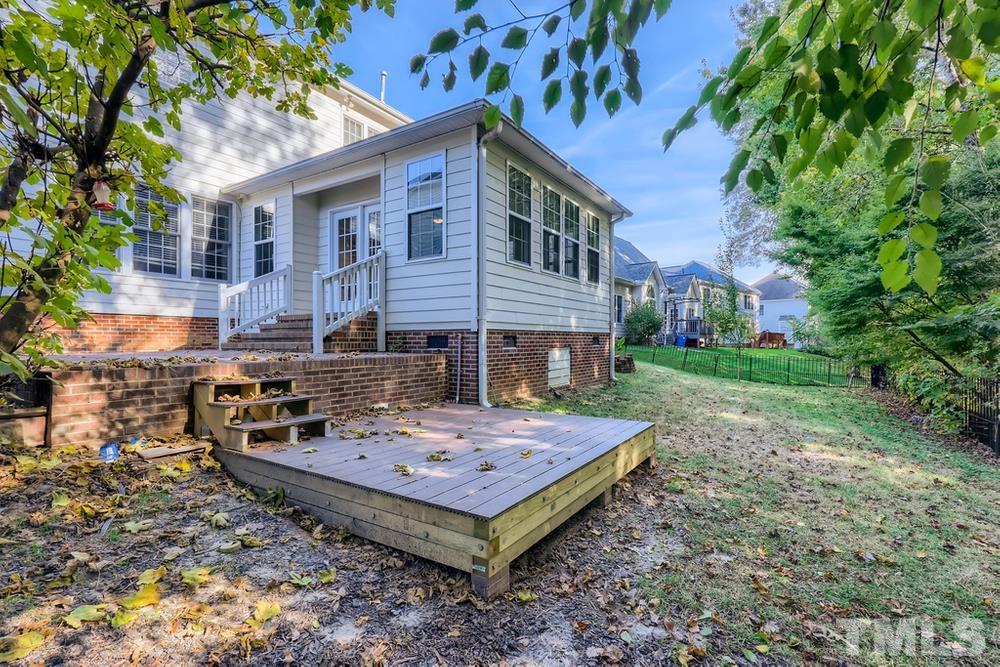 6040 Big Sandy Drive Raleigh, NC 27616 - Photo 27 of 28 a view of a house with backyard