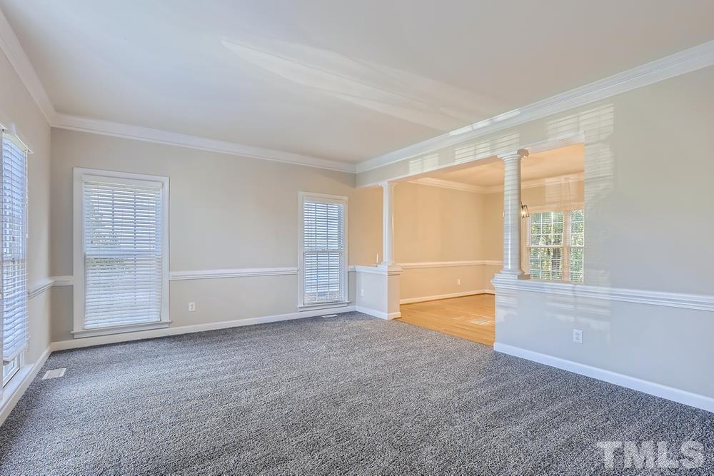 6040 Big Sandy Drive Raleigh, NC 27616 - Photo 4 of 28 a view of an empty room with a window