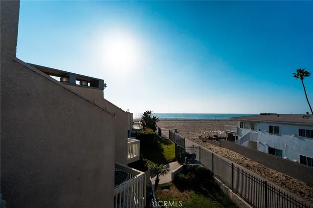 a kitchen with stove and cabinets