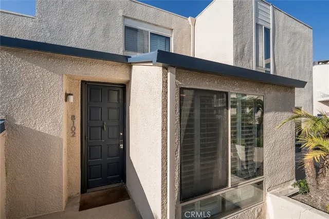 a house view with a outdoor space