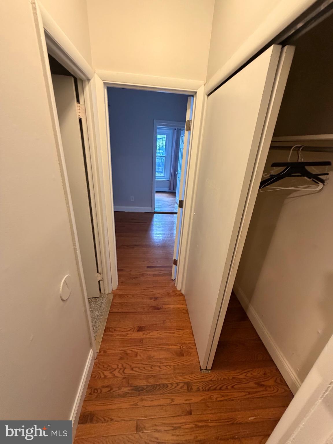 414 South 15th Street, Unit 1R Philadelphia, PA 19146 - Photo 12 of 16 a view of a hallway with wooden floor and staircase