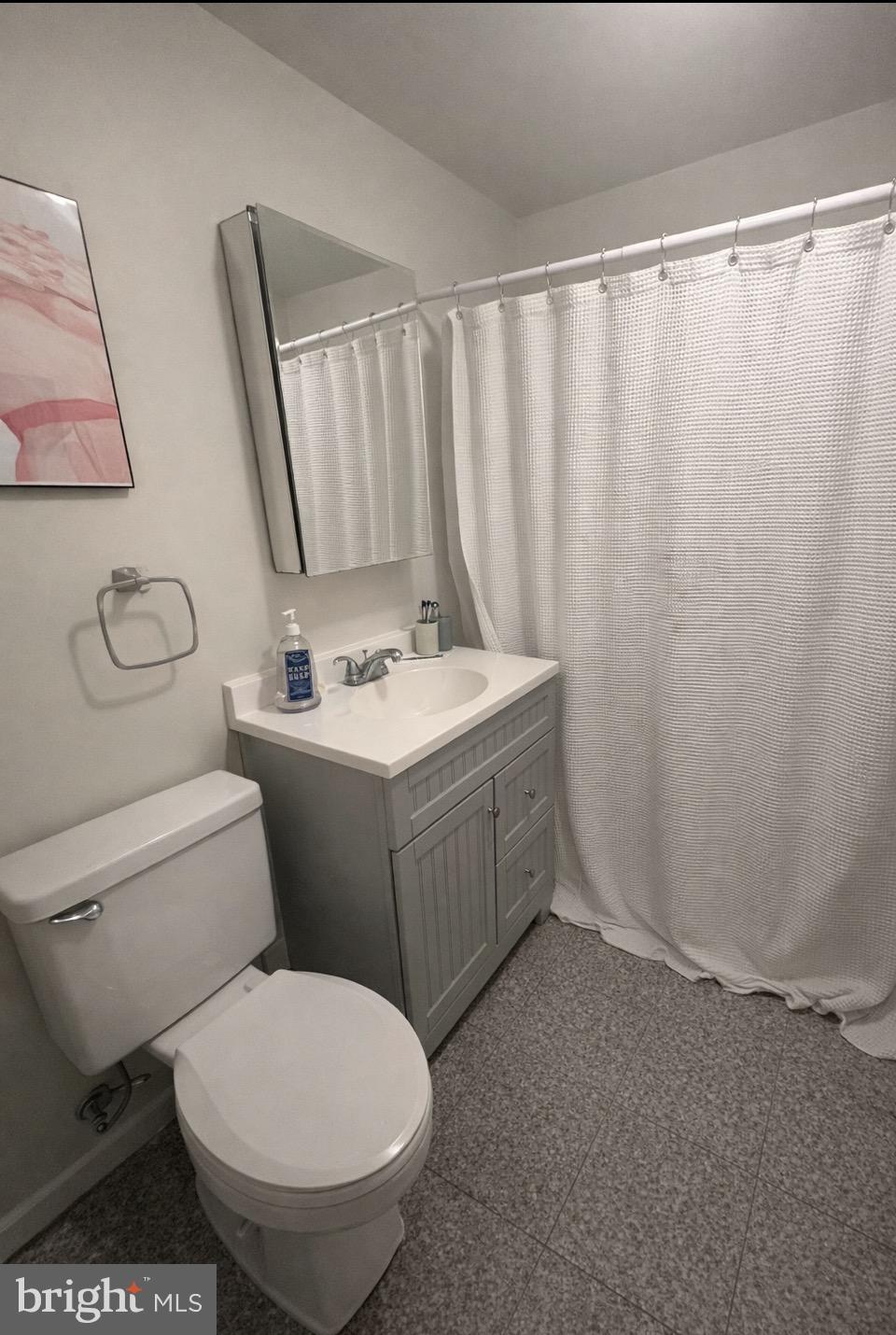 414 South 15th Street, Unit 1R Philadelphia, PA 19146 - Photo 4 of 16 a bathroom with a sink toilet and shower