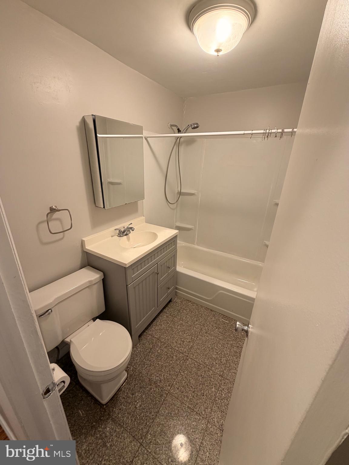 414 South 15th Street, Unit 1R Philadelphia, PA 19146 - Photo 10 of 16 a bathroom with a toilet sink and shower