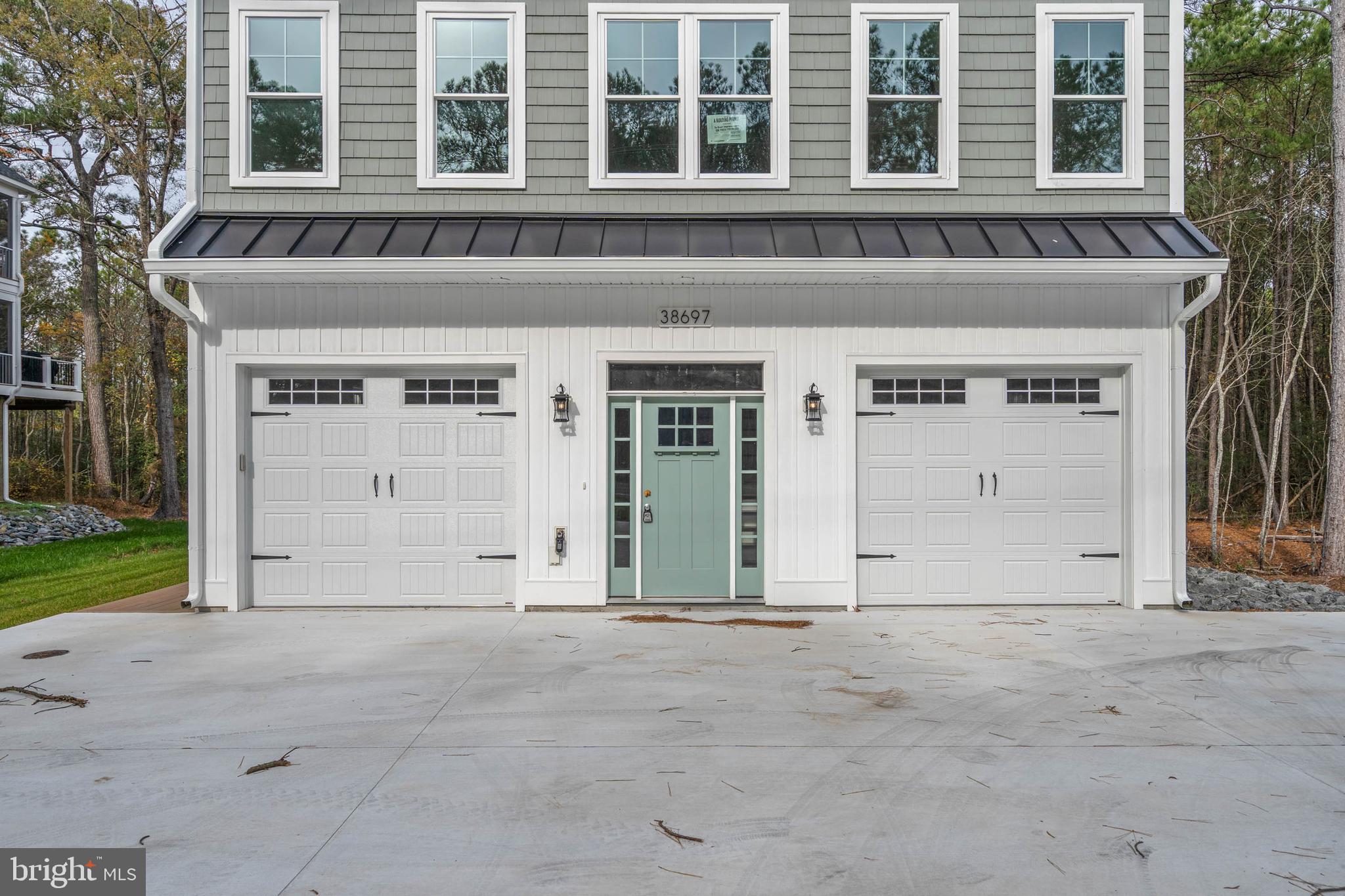 38697 Fred Hudson Road Bethany Beach, DE 19930 - Photo 5 of 51 front view of a building