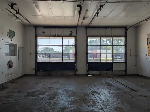 an empty room with windows