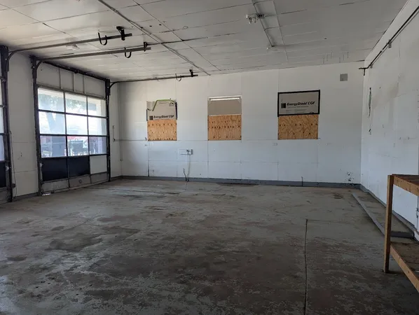 a view of empty room with windows