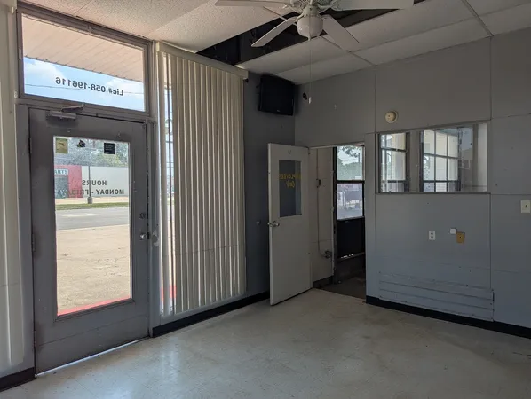 an empty room with windows