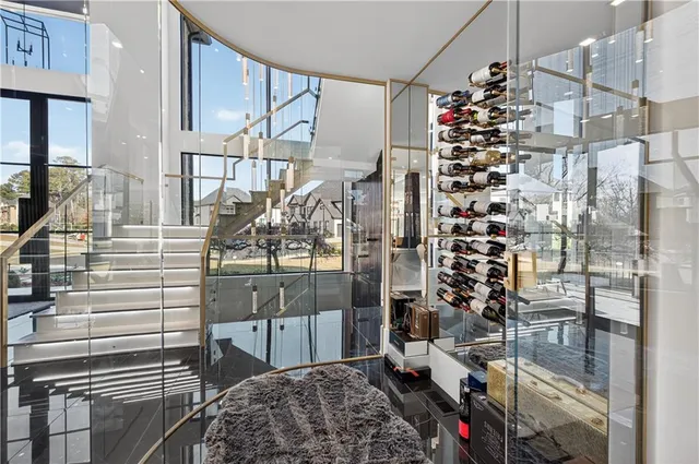 a kitchen with a sink and a stove top oven