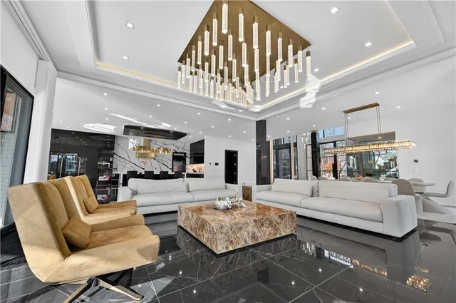 a kitchen with a table chairs sink and cabinets