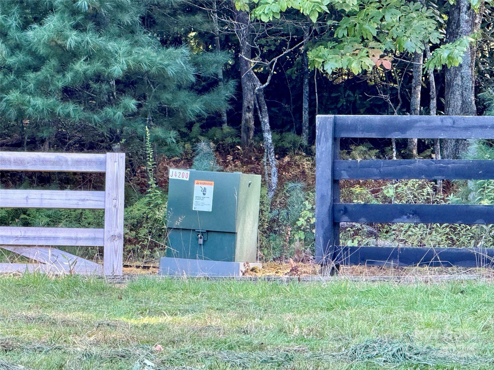 Tbd Slick Fisher Road Lake Toxaway, NC 28747 - Photo 11 of 13 front view of house with a yard