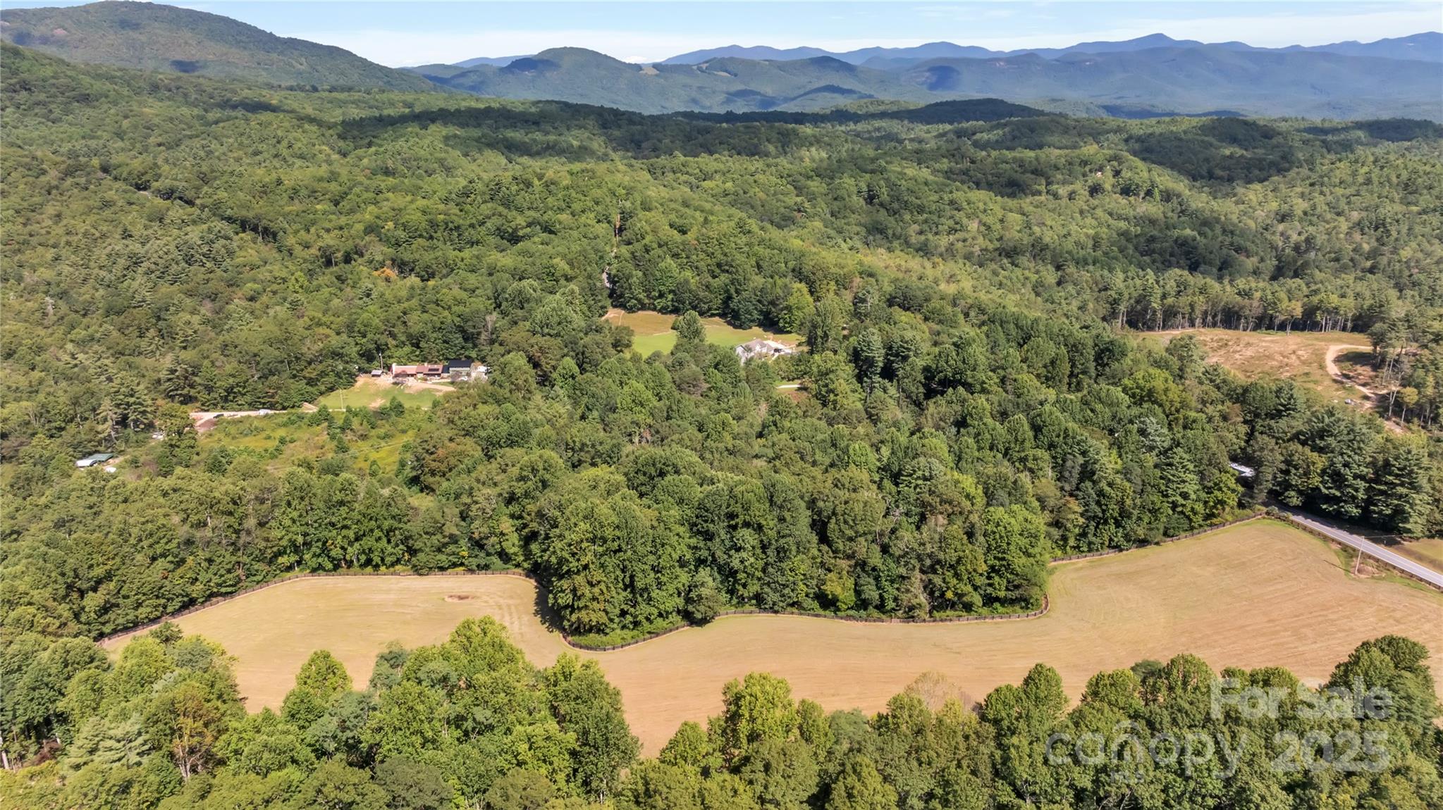 Tbd Slick Fisher Road Lake Toxaway, NC 28747 - Photo 3 of 13 a view of a mountain in the distance