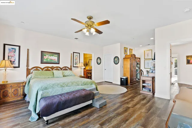 a bathroom with a bathtub a toilet and a shower