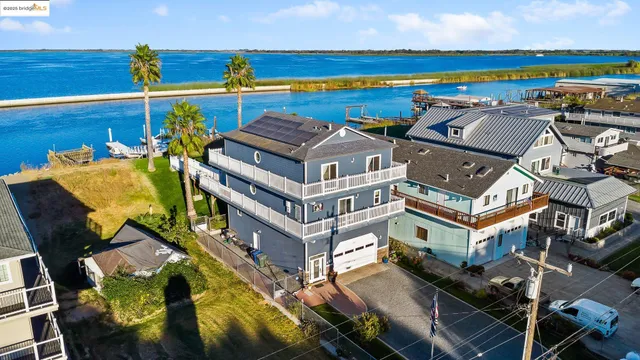 an aerial view of a house with a swimming pool