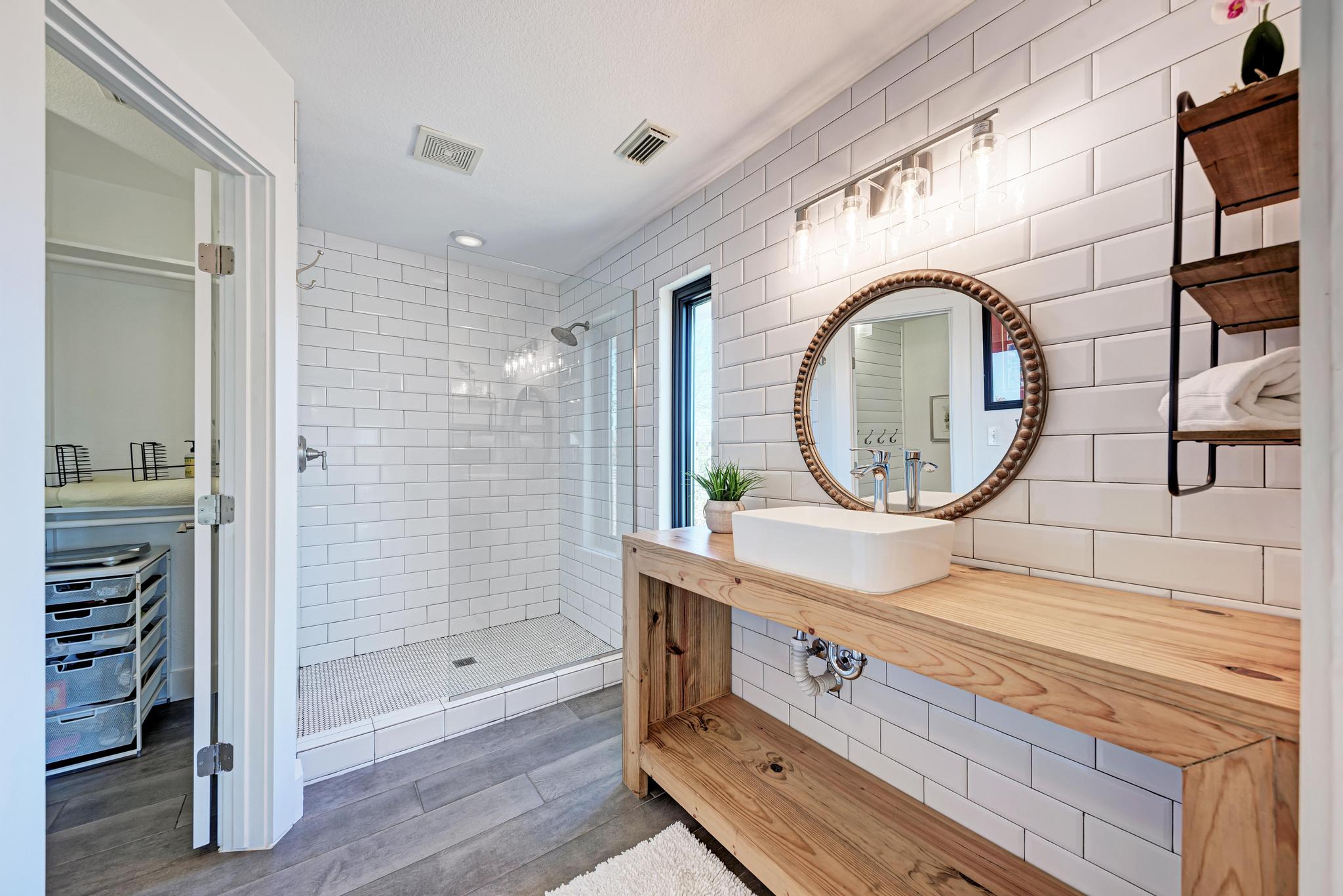 255 Glasscock Road Liberty Hill, TX 78642 - Photo 14 of 39 Primary bathroom with walk-in closet