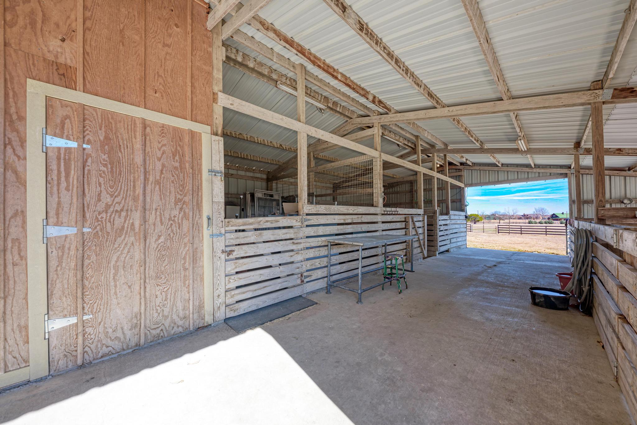 255 Glasscock Road Liberty Hill, TX 78642 - Photo 27 of 39 Horse barn/paddocks/tack room