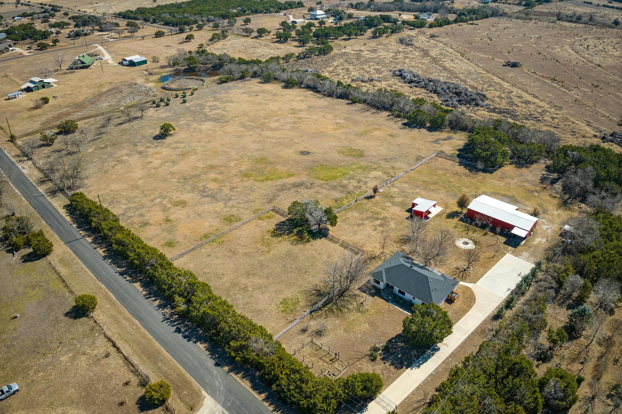 255 Glasscock Road Liberty Hill, TX 78642 - Photo 32 of 39 View of property and pastures