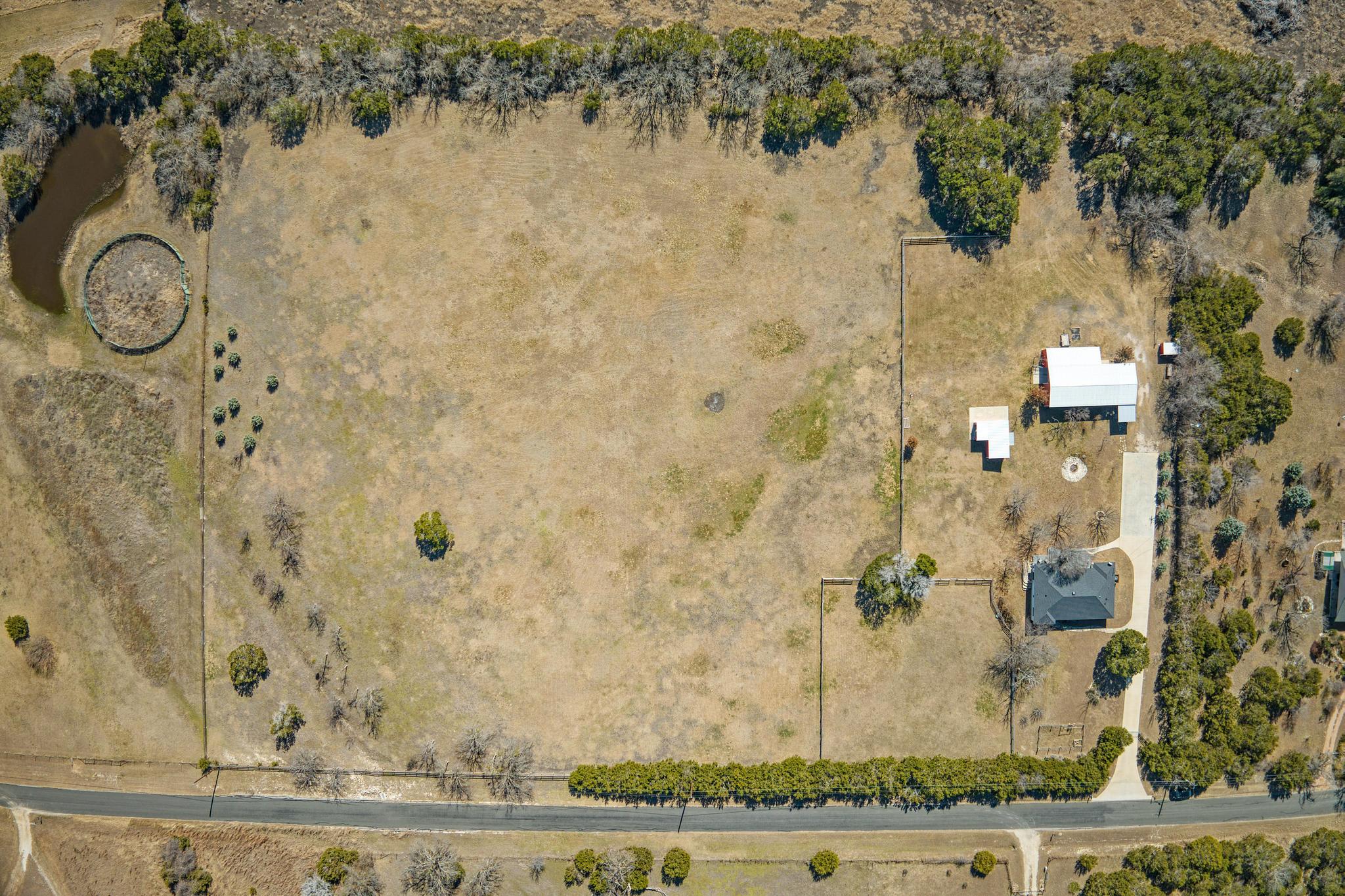 255 Glasscock Road Liberty Hill, TX 78642 - Photo 34 of 39 View of property and pastures