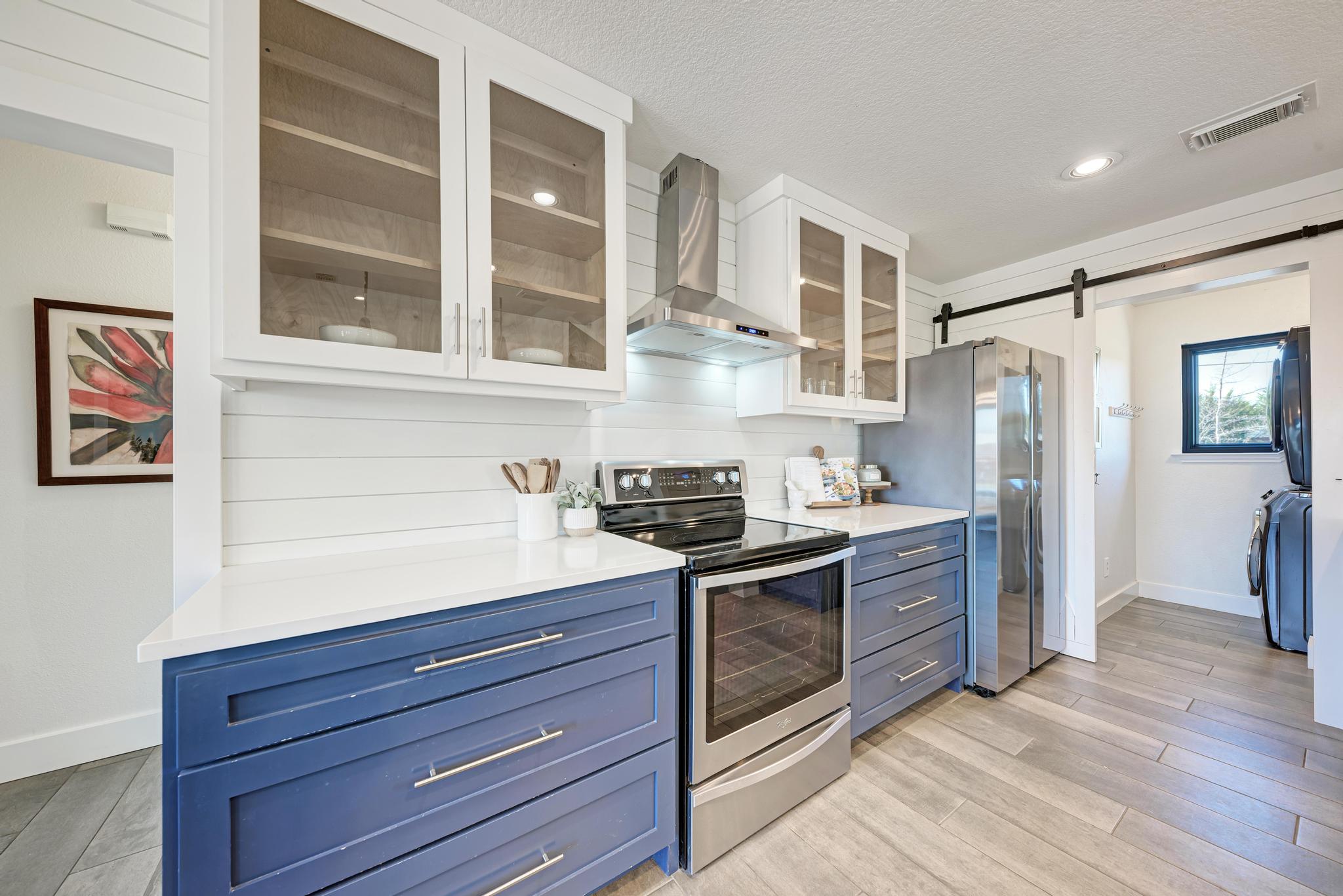 255 Glasscock Road Liberty Hill, TX 78642 - Photo 10 of 39 Kitchen, pantry/laundry room off kitchen