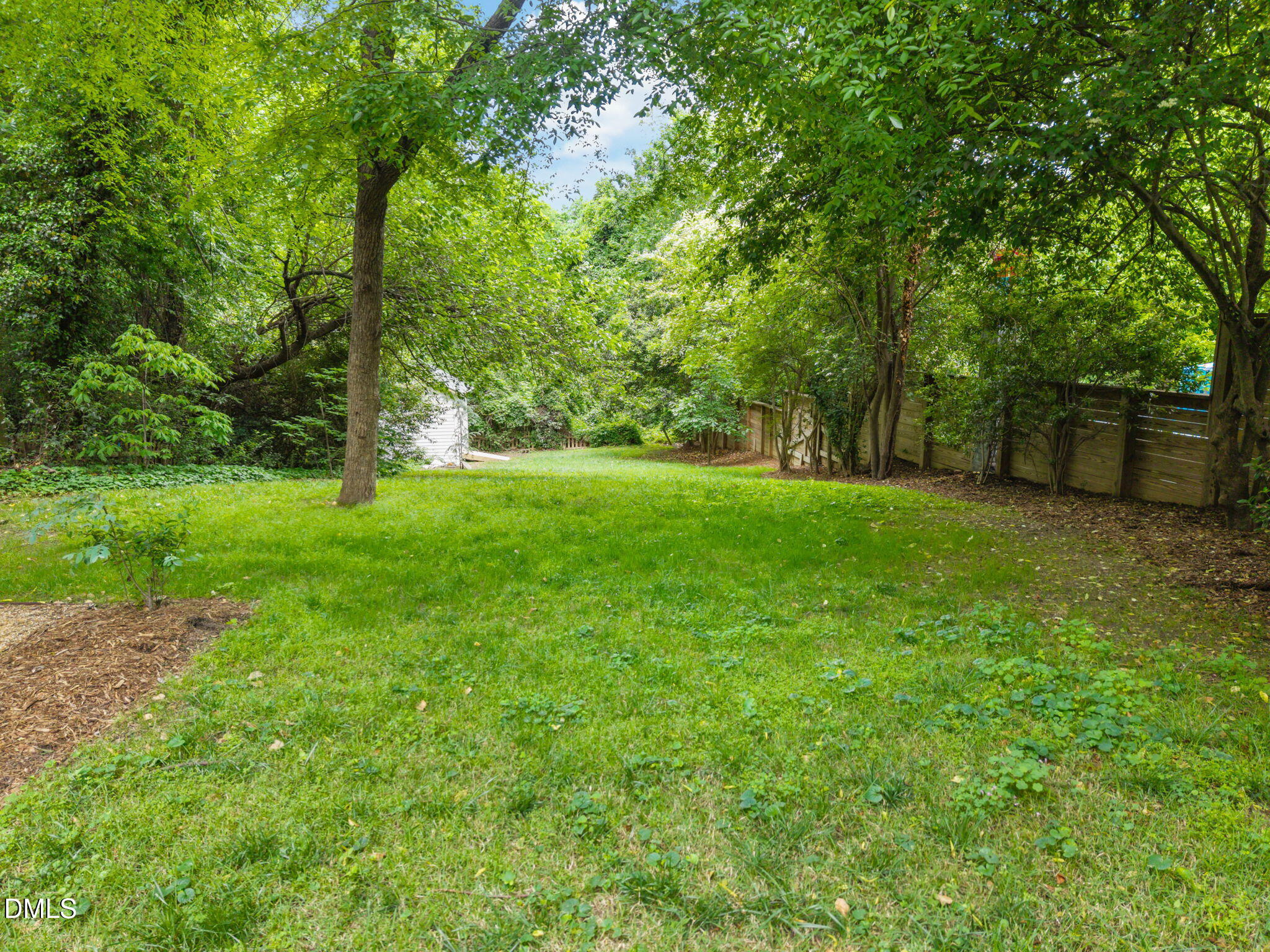 1531 Sunrise Avenue Raleigh, NC 27608 - Photo 9 of 51 9-web-or-mls-DJI_20260501103946_0945_D