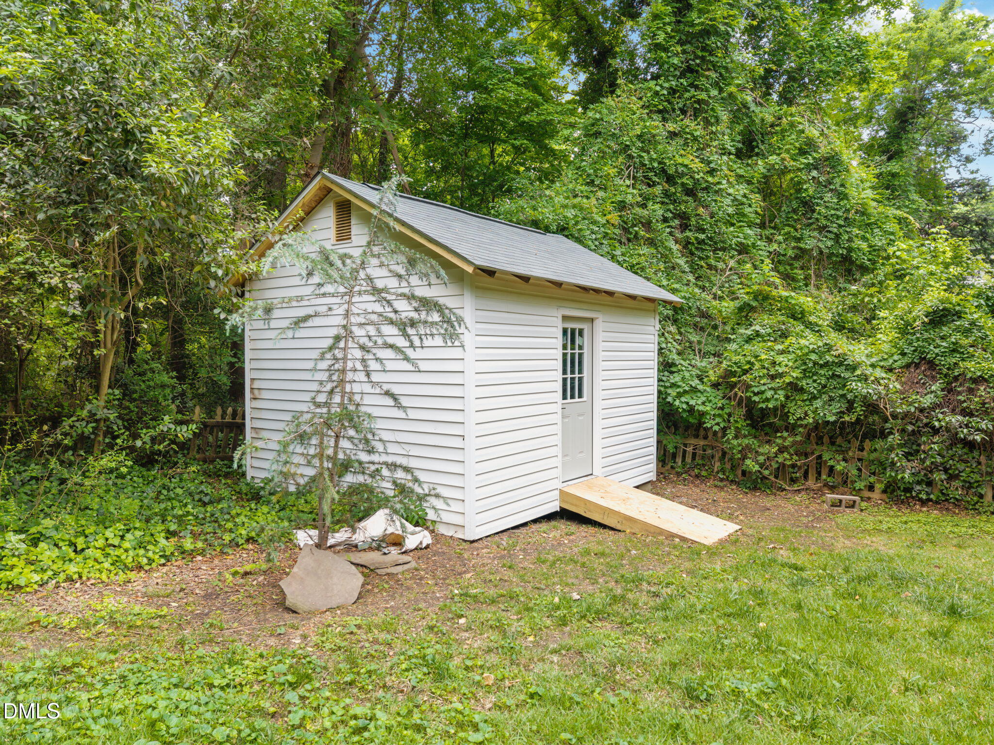 1531 Sunrise Avenue Raleigh, NC 27608 - Photo 10 of 51 10-web-or-mls-DJI_20260501104012_0946_D