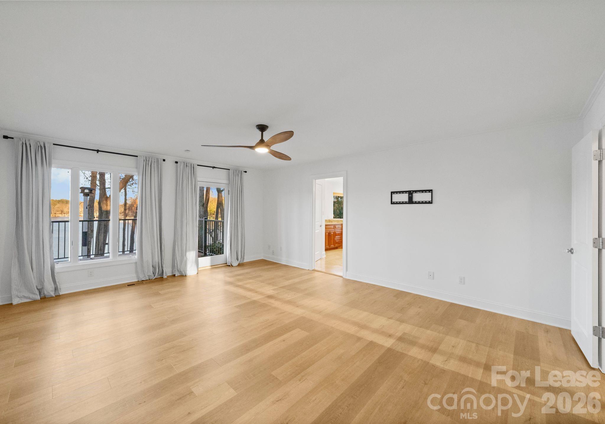 19709 Stough Farm Road Cornelius, NC 28031 - Photo 19 of 48 a view of an empty room with a window