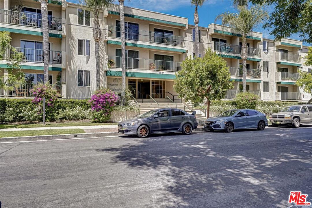 4501 Cedros Avenue, Unit 135 Sherman Oaks, CA 91403 - Photo 2 of 19 a car parked in front of a building