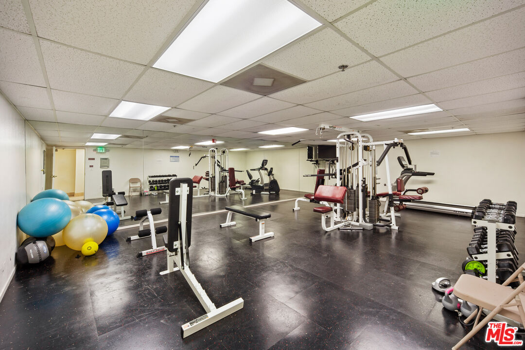 4501 Cedros Avenue, Unit 135 Sherman Oaks, CA 91403 - Photo 7 of 19 a view of a room with gym equipment