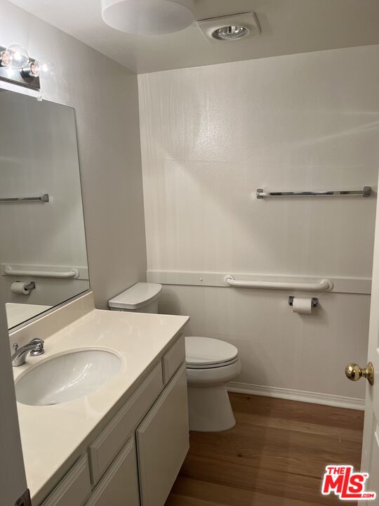 4501 Cedros Avenue, Unit 135 Sherman Oaks, CA 91403 - Photo 9 of 19 a bathroom with a sink and a toilet