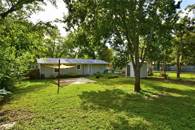 a house view with a garden space