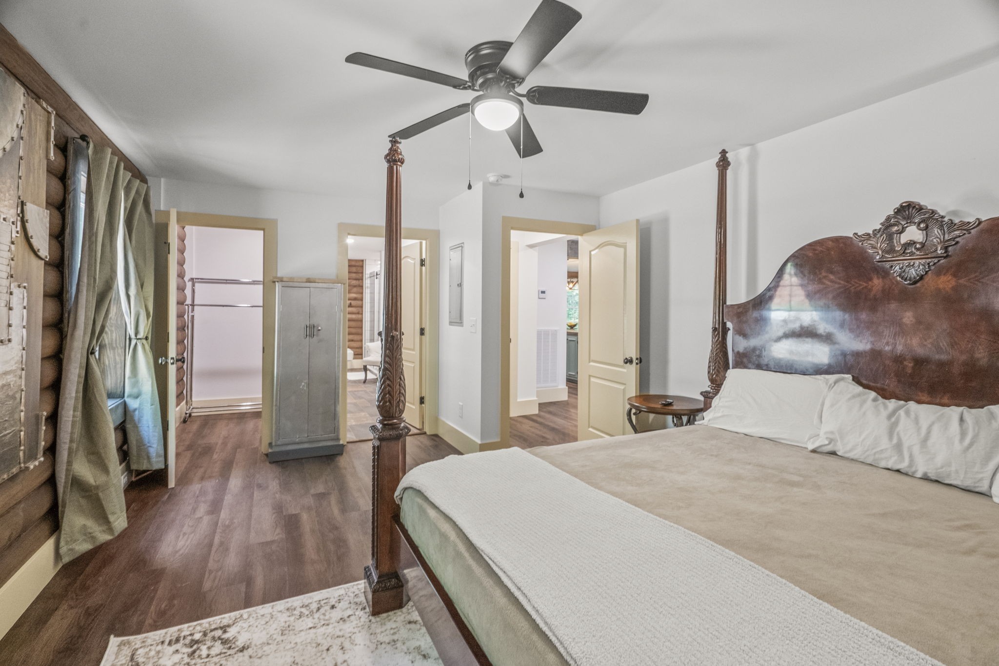 1068 Carl Perry Road Joelton, TN 37080 - Photo 22 of 58 a bedroom with a bed and a large mirror
