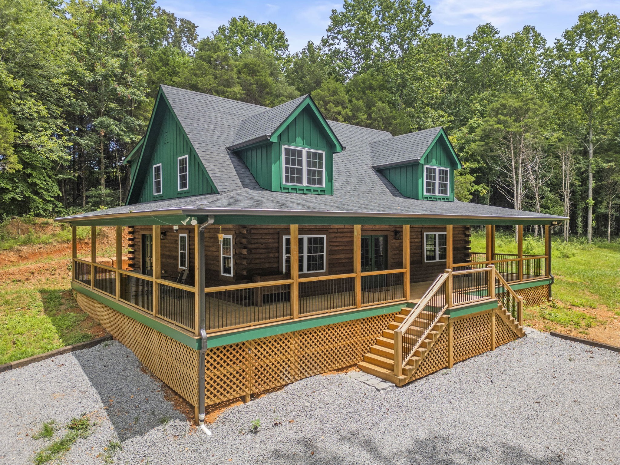 1068 Carl Perry Road Joelton, TN 37080 - Photo 3 of 58 a view of a house with a balcony and wooden floor