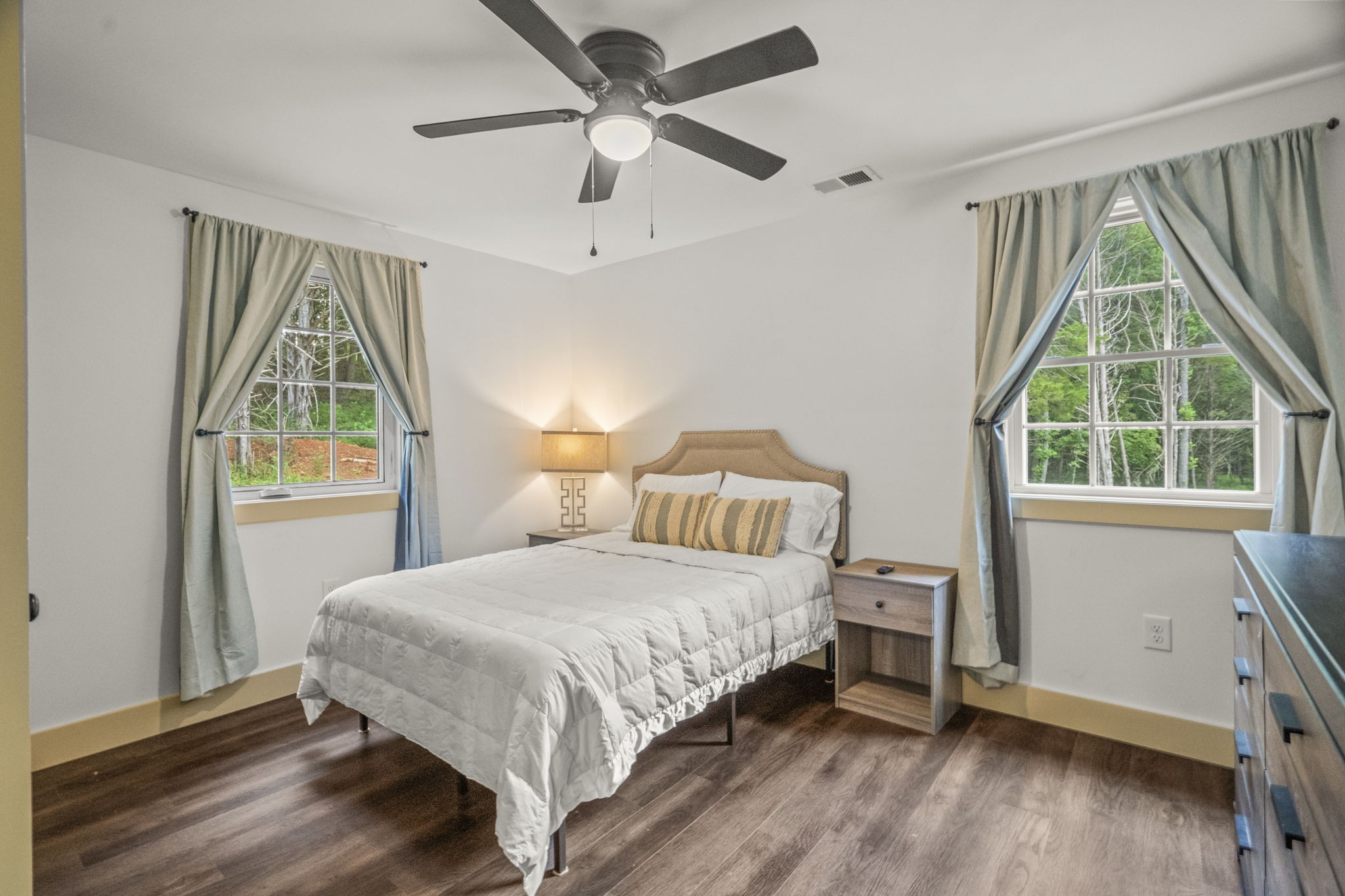 1068 Carl Perry Road Joelton, TN 37080 - Photo 33 of 58 a bedroom with a bed and a window