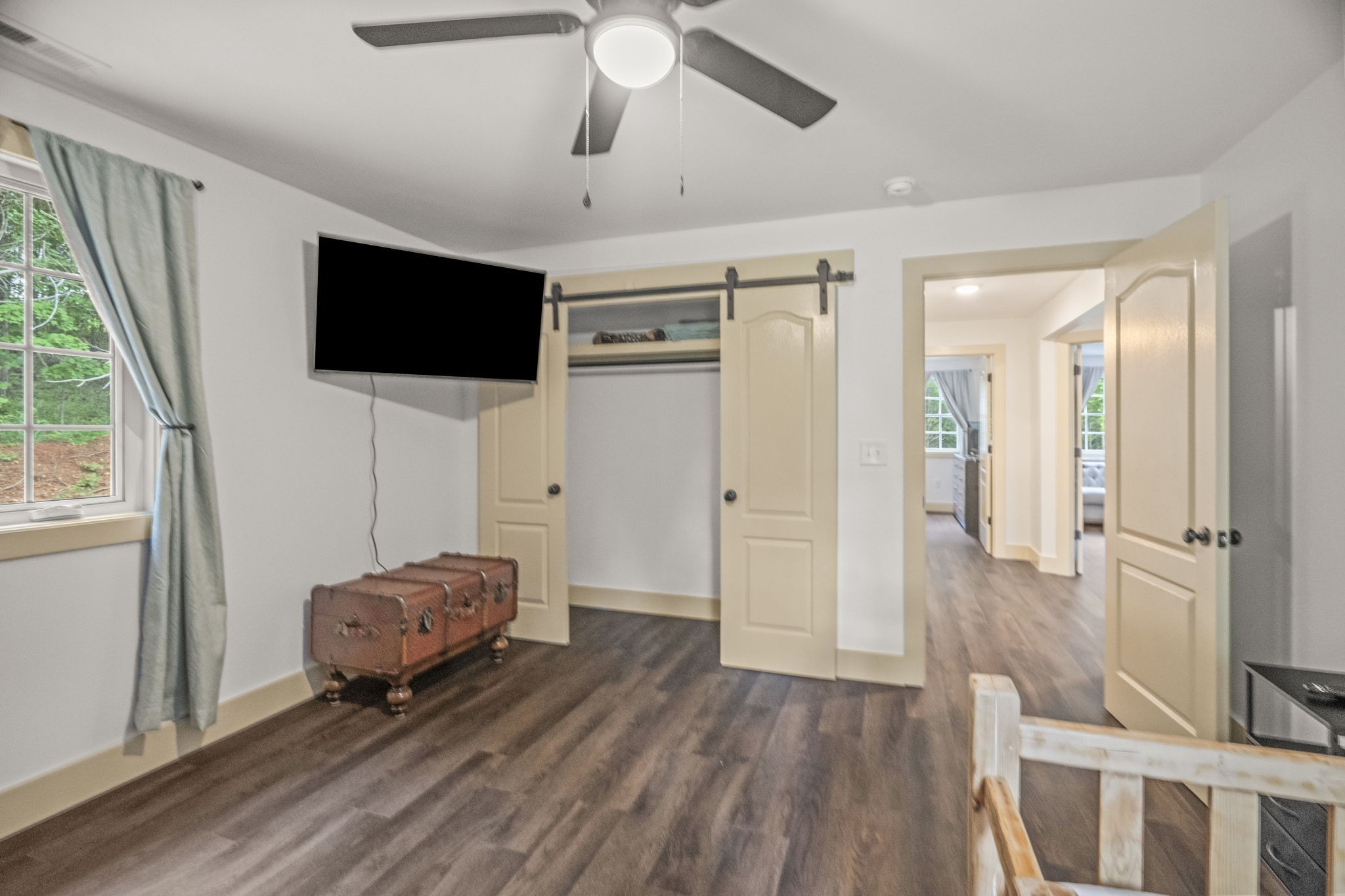 1068 Carl Perry Road Joelton, TN 37080 - Photo 36 of 58 a living room with furniture and a flat screen tv