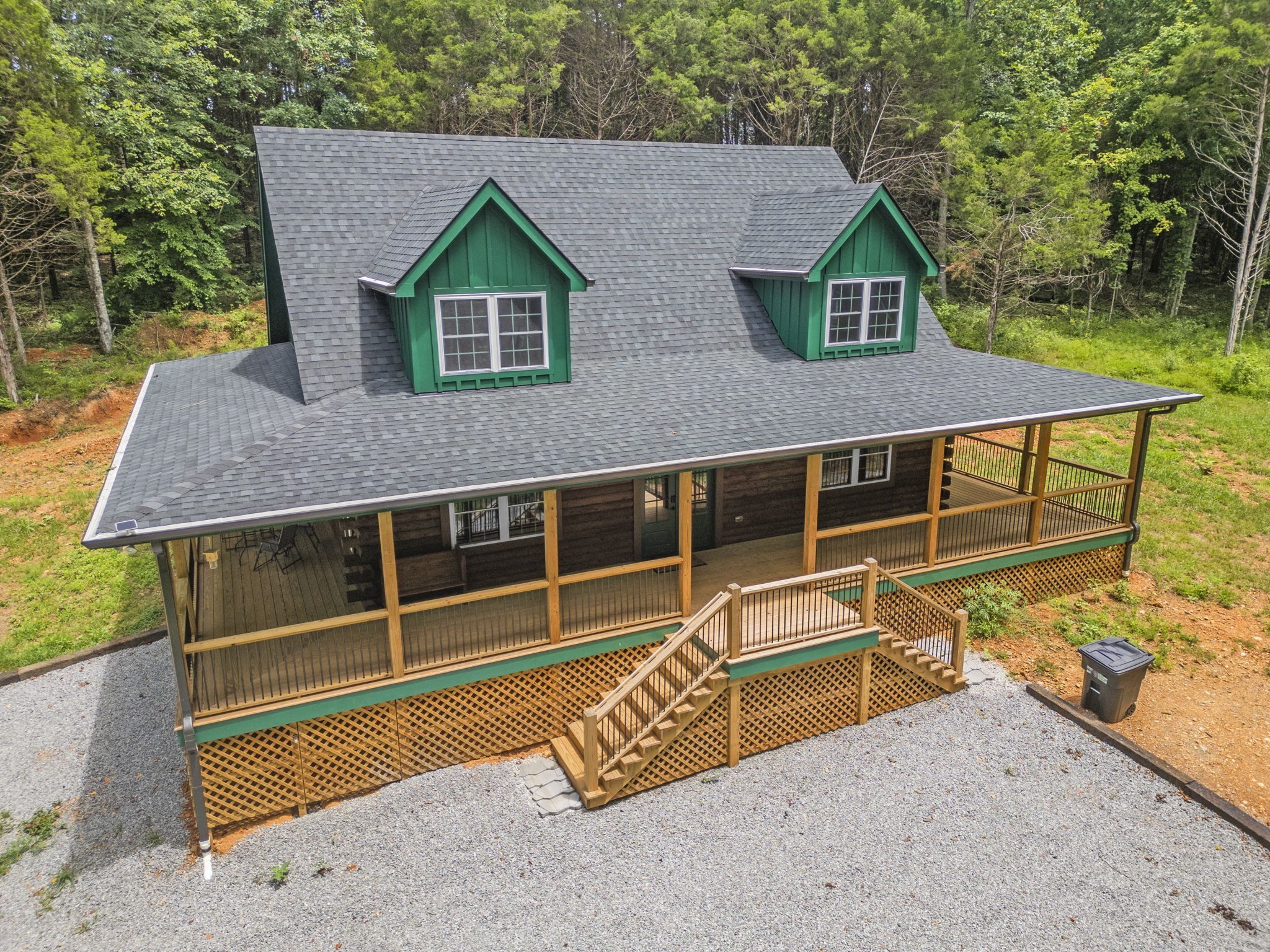 1068 Carl Perry Road Joelton, TN 37080 - Photo 4 of 58 a view of a house with a backyard and wooden deck