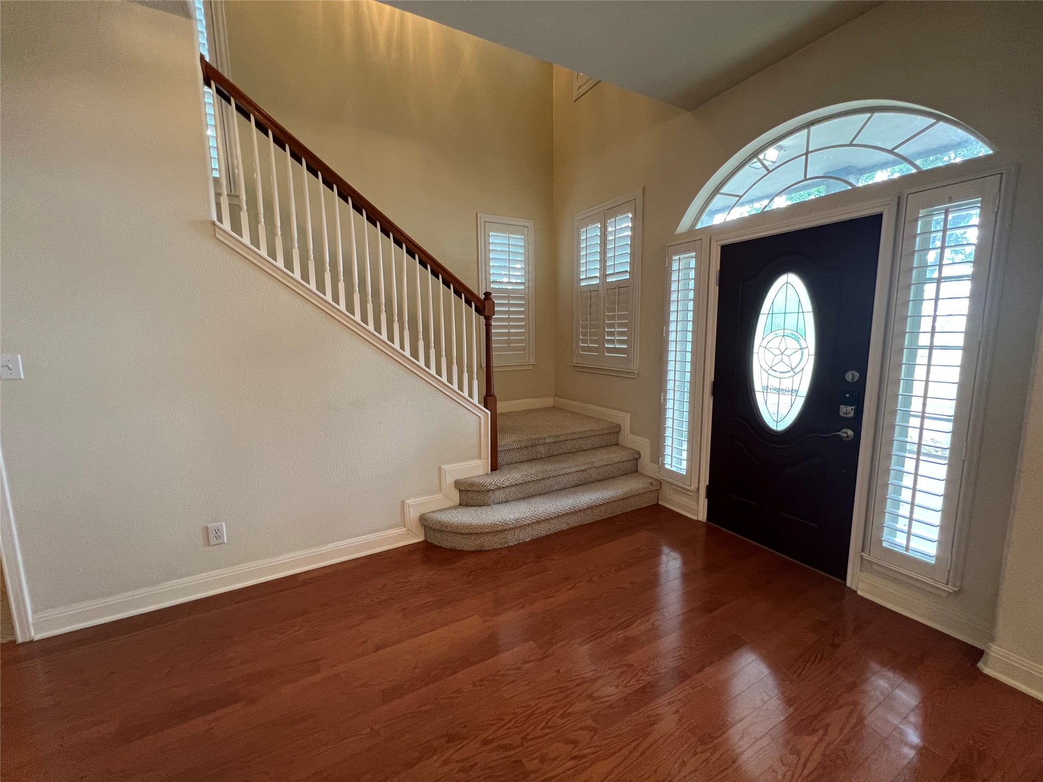 6126 Hartson Kyle, TX 78640 - Photo 3 of 14 a view of entryway with wooden floor