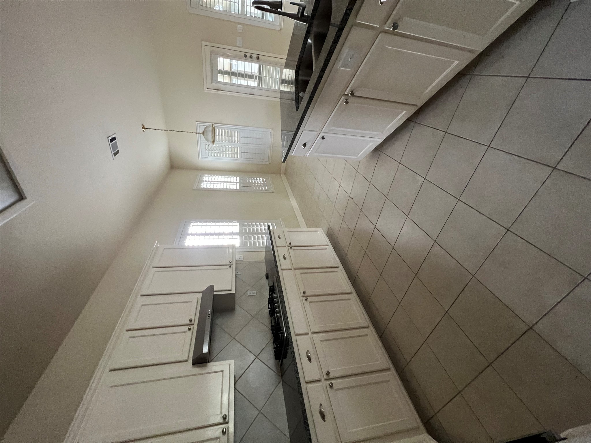 6126 Hartson Kyle, TX 78640 - Photo 10 of 14 a large kitchen with cabinets